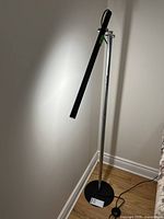 Full view of lamp illuminated in corner