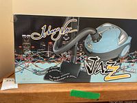 Retail box showing Johnny Vac branding and Jaz model