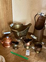 Group shot of all six mixed-metal hearthware items