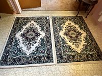 Both rugs side by side on floor showing full design and size