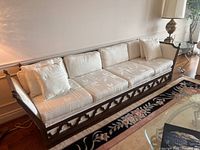 Full view of sofa left angle showing frame, cushions, side pillow