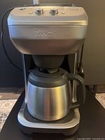 Front view of Breville Precision Brewer with thermal carafe inserted