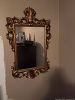 full view of mirror hanging on wall