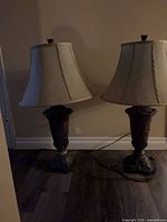 Both matching table lamps standing on floor; shows full design
