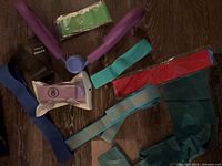 Group view of thigh master and assorted resistance bands