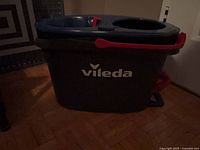 Front view showing Vileda logo and bucket body