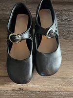 top view of both shoes showing uppers, buckle straps