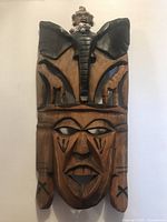 Front view of full wooden mask