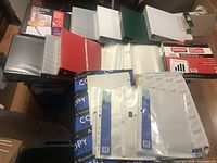 Overview of sheet protectors, binders, copy paper