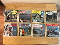 Front view of eight View-Master packets displaying cover titles and artwork