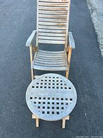 Teak folding chair and round lattice top side table