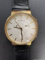 Front view of Skagen SKW6149 chronograph watch showing dial, hands, sub-dials and leather strap