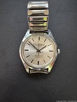 Front view of Herdez wristwatch showing dial, case and bracelet