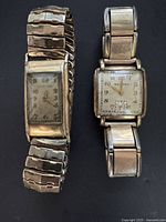 Two wristwatches side by side showing overall condition and missing crown on rectangular watch