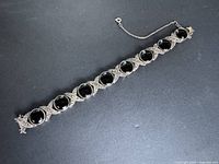 Top view of full bracelet showing all links and clasp