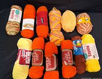 Group of 13 bright and variegated skeins/balls