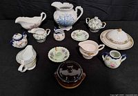 Full lot overview showing all porcelain and ceramic pieces