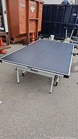 Angled view of full JOOLA table tennis table set up