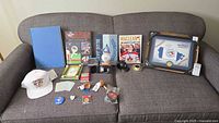 Entire lot displayed on sofa showing all items grouped