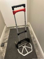 Hand truck folded with platform down