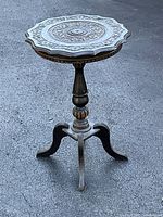 Full view showing entire side table height and tripod legs