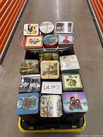 All coaster sets stacked on cart