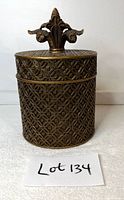 Front view of bronze resin lidded candy dish