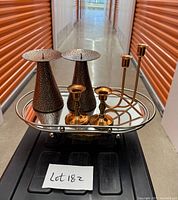 Group shot of all five copper candle holders on mirror tray (tray not included)