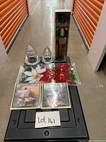 All items grouped on tote: two glass trees, boxed nutcracker, fused glass platter, two Kinkade cards