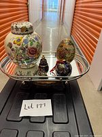 Group view of all four decor items on mirror tray