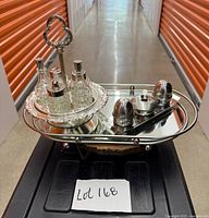 Both condiment sets displayed; mirror tray visible but not included