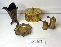 group shot of all five brass items