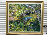 Full view of framed painting showing subject and frame