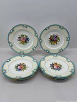 Front view showing all eight plates stacked and displayed