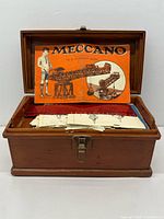 Box open showing instruction booklet and paperwork