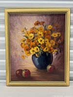 front view of framed painting showing subject and frame