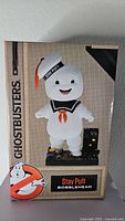 Front of boxed Ghostbusters Stay Puft bobblehead