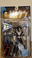 Front view of sealed Ace Frehley action figure in original blister pack