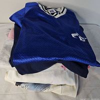 Stack of folded vintage shirts