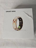 Box showing image and label of smart ring