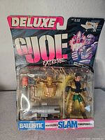 Front view of sealed GI Joe Extreme Ballistic figure and accessories in blister package