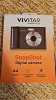 Front of box showing Vivitar SnapShot camera image and 44 megapixel, 2.8" screen details