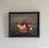 Front view of framed floral oil painting