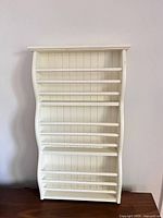 Front view of full rack showing shelves, side curves and color