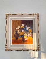 full view of framed painting on wall