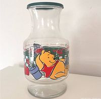 Front view showing Winnie the Pooh graphic and lid