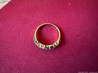 Ring front view showing stone arrangement