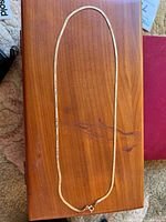 Full view of necklace laid flat