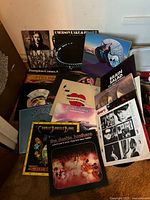 Group shot of all records spread on floor showing titles and cover art