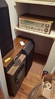 Receiver and one speaker in closet nook